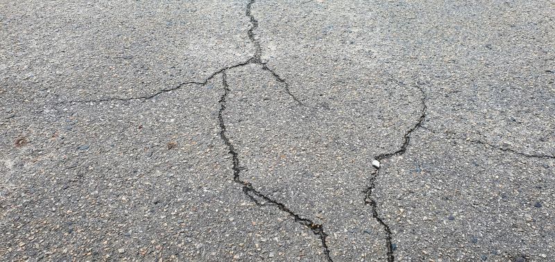 Common Causes Of Asphalt Damage In Commercial Parking Lots